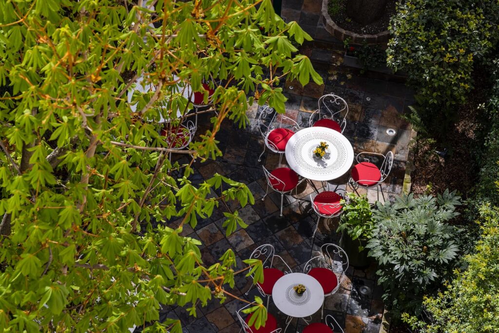 Paris Hotel Breakfast in the garden of the Hotel des Marronniers. View from the Superior Room.