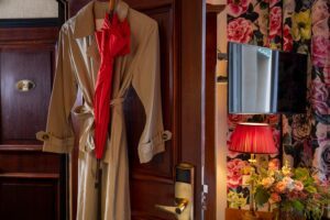 trench on the door of a double room - hotel with restaurant nearby Paris